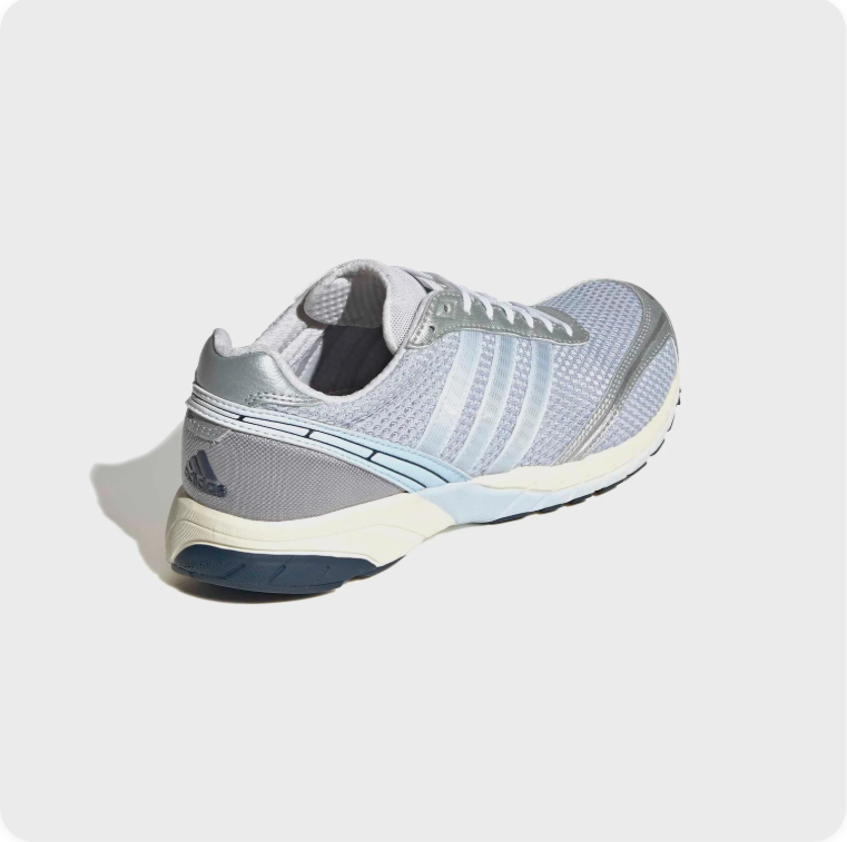Adidas Adizero Boston 6 Sky Blue Silver - rear three-quarter view showing metallic silver heel counter and navy outsole