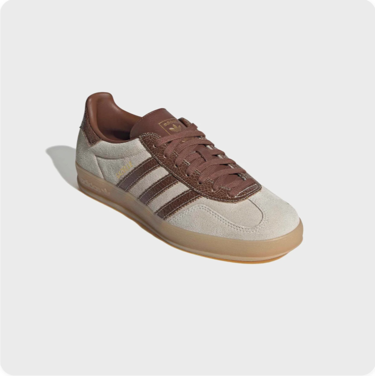 Adidas Gazelle Indoor Cream Chocolate Brown - front three-quarter view showing gold GAZELLE script and brown laces