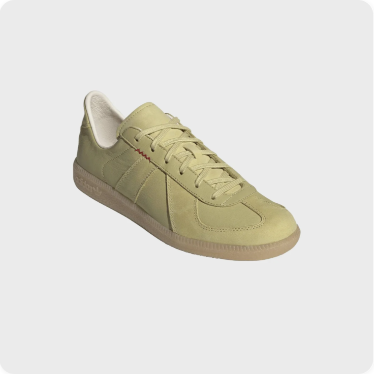 Adidas BW Army Pale Yellow - front three-quarter view showing tonal 3-Stripes and red stitch detail